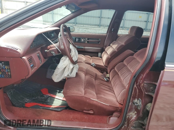 1991 Chevrolet Caprice z VIN 1G1BN53E9MW187619, wystawiony jako Copart lot #55291845 z przebiegiem 1 433 530 mil mil oraz Szkoda całkowita • Salvage title. Historia ofert i sprzedaży dostępna na DreamBid. Obrazek 7.