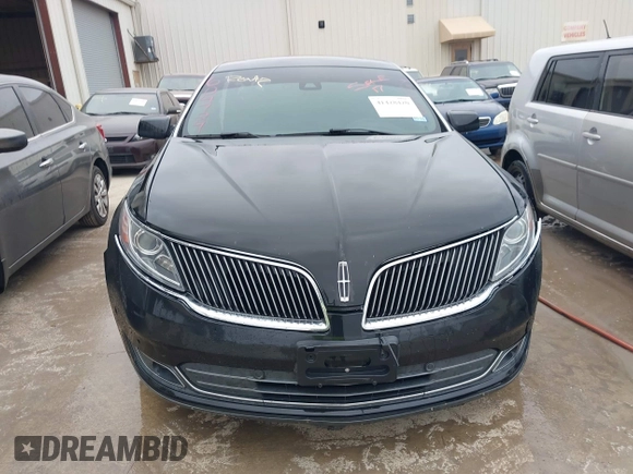2013 Lincoln MKS EcoBoost with VIN 1LNHL9FT2DG604724, listed as a IAAI auction lot 41428420 with 152,880 mi miles and . Bid and sale history available at DreamBid. Image 12.