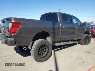 2017 Nissan Titan XD SL with VIN 1N6BA1F27HN547900, listed as a Copart auction lot 76158824 with 148,067 mi miles and Salvage Title. Bid and sale history available at carsss.com. Image 3.