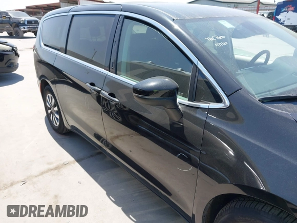 2023 Chrysler Pacifica Hybrid Touring L z VIN 2C4RC1L77PR540958, wystawiony jako IAAI lot #42010484 z przebiegiem 61 166 mil mil oraz . Historia ofert i sprzedaży dostępna na DreamBid. Obrazek 13.