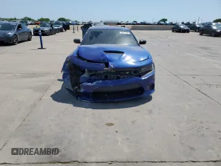 2019 Dodge Charger Scat Pack z VIN 2C3CDXGJXKH553024, wystawiony jako Copart lot #53058985 z przebiegiem 80 575 mil mil oraz Szkoda całkowita • Salvage title. Historia ofert i sprzedaży dostępna na DreamBid. Obrazek 5.