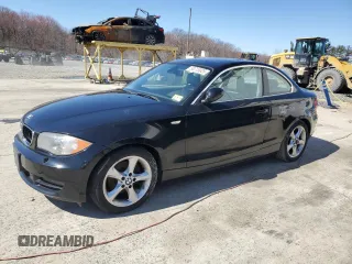 2009 BMW 1 Series 128i with VIN WBAUP93519VF48985, listed as a Copart auction lot 50715925 with 105,590 mi miles and Salvage title. Bid and sale history available at DreamBid. Image 1.