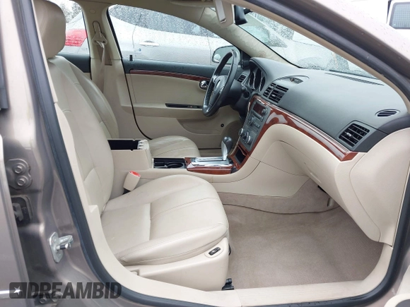 2007 Saturn Aura XE with VIN 1G8ZS57N77F257786, listed as a IAAI auction lot 41736785 with 82,998 mi miles and . Bid and sale history available at DreamBid. Image 4.