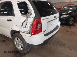 2009 Kia Sportage LX with VIN KNDJE723497563630, listed as a IAAI auction lot 41911423 with 213,040 mi miles. Bid and sale history available at carsss.com. Image 6.