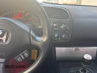 2005 Honda S2000 с VIN JHMAP21425S007703, выставлен на аукционе Copart как лот 47661415 с пробегом 159 918 миль миль и Чистый • Clean title. История ставок и продаж доступна на DreamBid. Изображение 9.