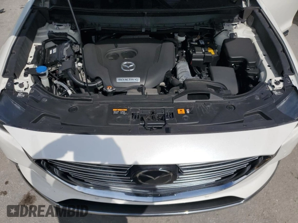 2021 Mazda CX-9 Grand Touring with VIN JM3TCADY7M0501717, listed as a Copart auction lot 59402875 with 53,218 mi miles and Salvage title. Bid and sale history available at DreamBid. Image 12.