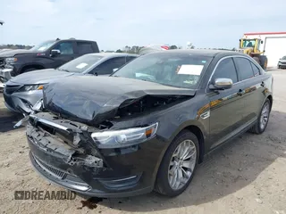 2016 Ford Taurus Limited with VIN 1FAHP2F8XGG130950, listed as a IAAI auction lot 41833038 with 128,536 mi miles and . Bid and sale history available at DreamBid. Image 2.