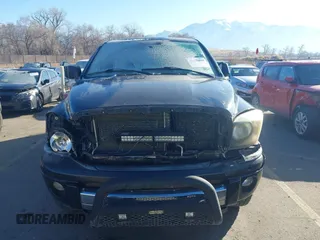 2006 Dodge Ram 1500 SLT with VIN 1D7HU18256S647953, listed as a IAAI auction lot 41430894 with 209,656 mi miles. Bid and sale history available at carsss.com. Image 12.