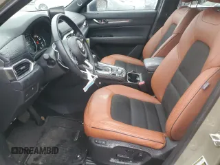 2024 Mazda CX-5 2.5 Carbon Turbo with VIN JM3KFBAY5R0419375, listed as a Copart auction lot 82000304 with 7,247 mi miles and Salvage Title. Bid and sale history available at carsss.com. Image 7.