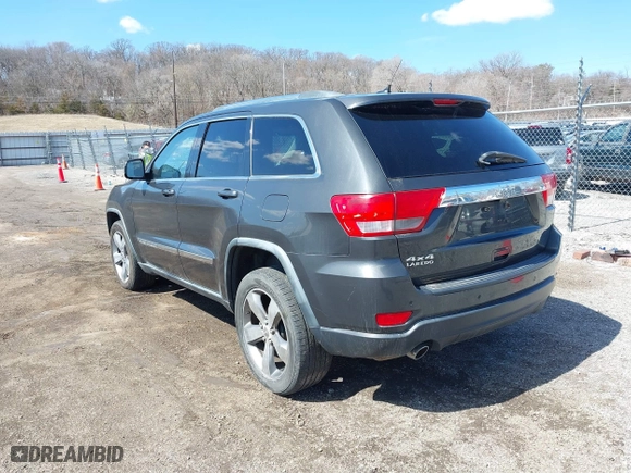 2011 Jeep Grand Cherokee Laredo with VIN 1J4RR4GT0BC543283, listed as a IAAI auction lot 41890109 with 123,325 mi miles. Bid and sale history available at carsss.com. Image 3.