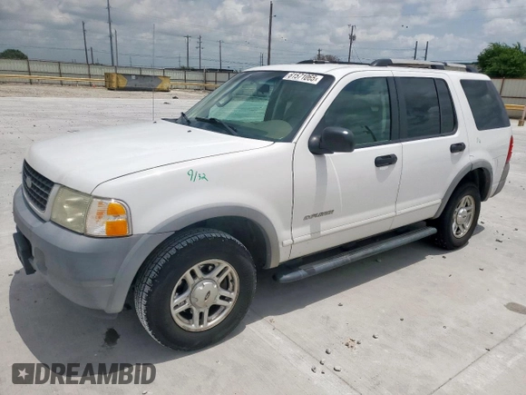 2002 Ford Explorer XLS with VIN 1FMZU62E62UA69368, listed as a Copart auction lot 61571065 with 124,095 mi miles and Salvage title. Bid and sale history available at DreamBid. Image 1.