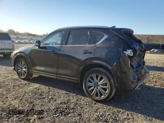 2024 Mazda CX-5 2.5 Turbo Signature with VIN JM3KFBXY8R0398139, listed as a Copart auction lot 76885954 with 7,266 mi miles and Salvage Title. Bid and sale history available at carsss.com. Image 2.