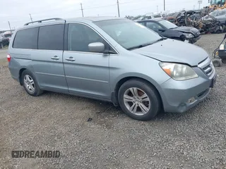 2007 Honda Odyssey Touring z VIN 5FNRL38847B004400, wystawiony jako IAAI lot #42455142 z przebiegiem 310 375 mil mil oraz . Historia ofert i sprzedaży dostępna na DreamBid. Obrazek 1.