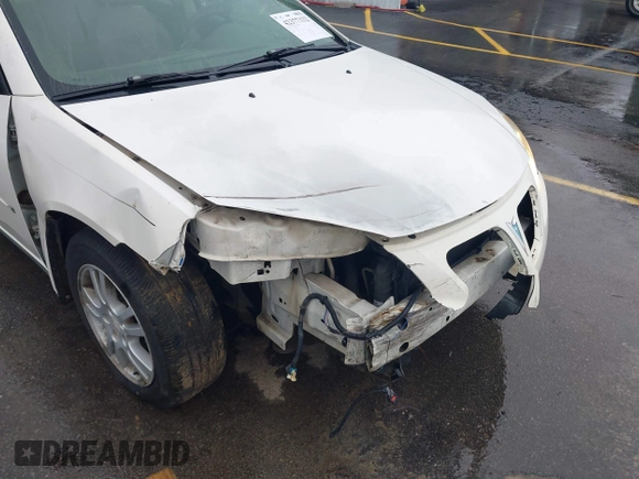 2006 Pontiac G6 6-Cyl z VIN 1G2ZG558364172091, wystawiony jako IAAI lot #42377332 z przebiegiem 199 495 mil mil oraz . Historia ofert i sprzedaży dostępna na DreamBid. Obrazek 6.