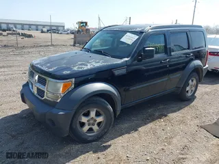 2007 Dodge Nitro SXT with VIN 1D8GU28K57W551957, listed as a IAAI auction lot 41914919 with 139,560 mi miles. Bid and sale history available at carsss.com. Image 2.