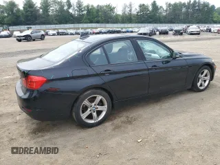 2013 BMW 3 Series 328i xDrive with VIN WBA3B5C51DF593749, listed as a Copart auction lot 60073825 with 96,017 mi miles and Salvage title. Bid and sale history available at DreamBid. Image 3.