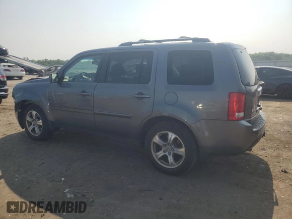 2012 Honda Pilot EX-L with VIN 5FNYF4H66CB084493, listed as a Copart auction lot 59683655 with 112,477 mi miles and Salvage title. Bid and sale history available at DreamBid. Image 2.