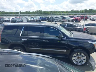 2019 Cadillac Escalade Platinum with VIN 1GYS4DKJ9KR138333, listed as a IAAI auction lot 42523430 with 104,787 mi miles and . Bid and sale history available at DreamBid. Image 13.