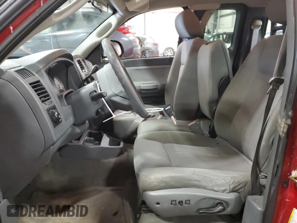 2006 Dodge Dakota SLT with VIN 1D7HW42NX6S717803, listed as a Copart auction lot 89000765 with 139,556 mi miles and Salvage Title. Bid and sale history available at carsss.com. Image 7.