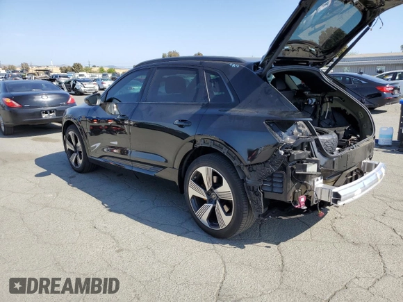 2022 Audi e-tron Premium Plus with VIN WA1LAAGE3NB009881, listed as a Copart auction lot 55096875 with 31,718 mi miles and Salvage title. Bid and sale history available at DreamBid. Image 2.