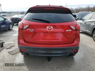 2014 Mazda CX-5 Grand Touring with VIN JM3KE4DY2E0417930, listed as a Copart auction lot 42735065 with 164,701 mi miles and Non Repairable. Bid and sale history available at DreamBid. Image 6.