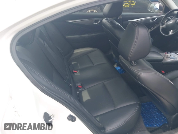 2015 Infiniti Q50 Premium with VIN JN1BV7AR5FM390985, listed as a IAAI auction lot 42641031 with 117,060 mi miles and . Bid and sale history available at DreamBid. Image 8.