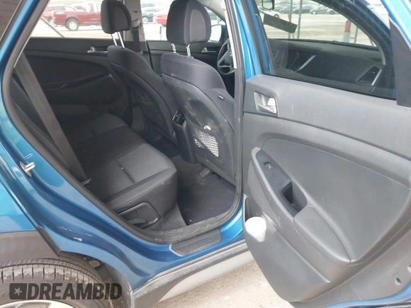 2018 Hyundai Tucson Sport with VIN KM8J33AL0JU803368, listed as a IAAI auction lot 41937235 with 64,163 mi miles and . Bid and sale history available at DreamBid. Image 8.