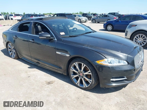 2015 Jaguar XJ R-Sport with VIN SAJWJ1CD6F8V83990, listed as a IAAI auction lot 41936162 with Not Provided miles and . Bid and sale history available at DreamBid. Image 1.