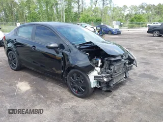 2014 Kia Rio LX with VIN KNADM4A33E6335499, listed as a IAAI auction lot 42123085 with 148,146 mi miles and . Bid and sale history available at DreamBid. Image 1.