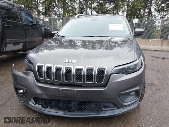 2020 Jeep Cherokee Altitude with VIN 1C4PJLLB9LD657063, listed as a IAAI auction lot 41977009 with 72,215 mi miles and . Bid and sale history available at carsss.com. Image 13.