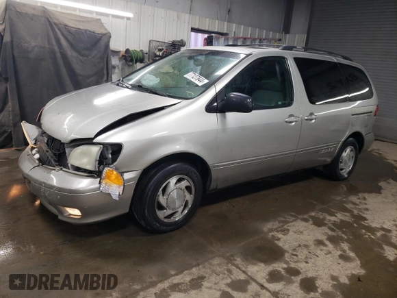 2002 Toyota Sienna LE with VIN 4T3ZF13C02U446097, listed as a Copart auction lot 77127844 with 182,873 mi miles and Salvage Title. Bid and sale history available at carsss.com. Image 1.