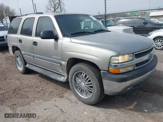 2003 Chevrolet Tahoe LS with VIN 1GNEC13V03R272663, listed as a IAAI auction lot 41933407 with 245,113 mi miles. Bid and sale history available at carsss.com. Image 1.