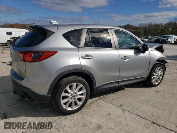 2013 Mazda CX-5 Grand Touring with VIN JM3KE4DE8D0102280, listed as a Copart auction lot 79750774 with 151,797 mi miles and Salvage Title. Bid and sale history available at DreamBid. Image 3.