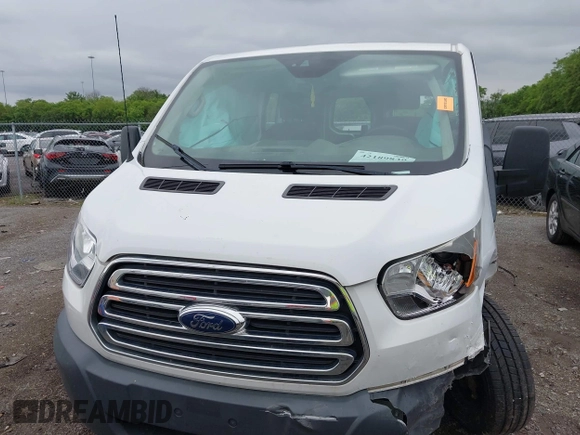 2018 Ford Transit with VIN 1FTYR1ZM2JKA98121, listed as a IAAI auction lot 42189839 with 116,414 mi miles and . Bid and sale history available at DreamBid. Image 12.