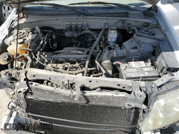 2005 Mercury Mariner Convenience с VIN 4M2YU56Z65DJ16579, выставлен на аукционе Copart как лот 48474465 с пробегом Не указан миль и На запчасти • Non repairable. История ставок и продаж доступна на DreamBid. Изображение 12.