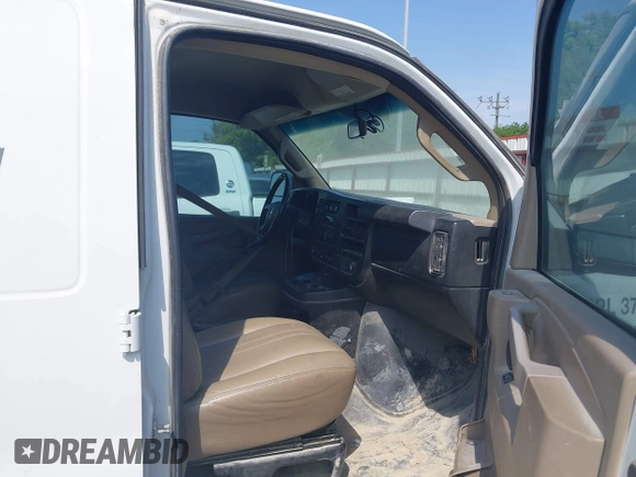 2017 Chevrolet Express Cargo Van with VIN 1GCWGAFF6H1176404, listed as a IAAI auction lot 42014572 with 104,378 mi miles. Bid and sale history available at carsss.com. Image 5.