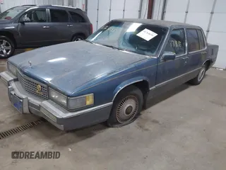 1990 Cadillac DeVille z VIN 1G6CD5331L4293427, wystawiony jako IAAI lot #41764635 z przebiegiem 198 499 mil mil oraz . Historia ofert i sprzedaży dostępna na DreamBid. Obrazek 2.