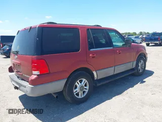 2003 Ford Expedition Special Service with VIN 1FMPU15L33LA76211, listed as a IAAI auction lot 42035061 with 211,599 mi miles. Bid and sale history available at carsss.com. Image 4.
