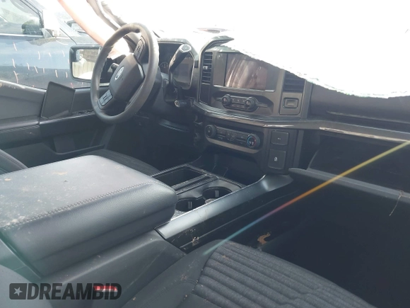 2021 Ford F-150 XL z VIN 1FTEW1C51MFC94173, wystawiony jako IAAI lot #41628222 z przebiegiem 23 266 mil mil oraz . Historia ofert i sprzedaży dostępna na DreamBid. Obrazek 5.