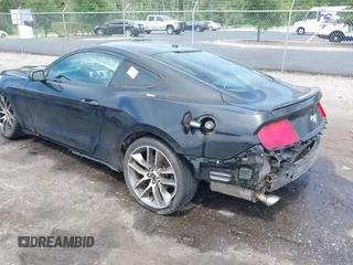 2015 Ford Mustang EcoBoost with VIN 1FA6P8TH5F5374241, listed as a IAAI auction lot 42556786 with 140,017 mi miles and . Bid and sale history available at DreamBid. Image 3.
