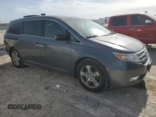 2012 Honda Odyssey Touring with VIN 5FNRL5H96CB122785, listed as a Copart auction lot 84459954 with 114,208 mi miles and Salvage Title. Bid and sale history available at carsss.com. Image 4.