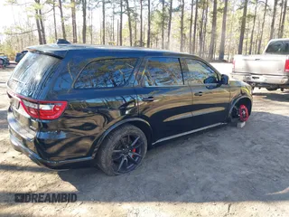 2018 Dodge Durango SRT with VIN 1C4SDJGJ6JC416538, listed as a IAAI auction lot 41440038 with 67,650 mi miles and . Bid and sale history available at DreamBid. Image 4.