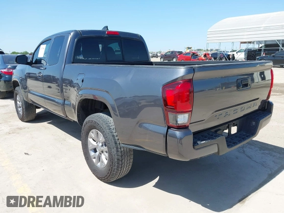 2020 Toyota Tacoma SR with VIN 3TYRX5GNXLT002488, listed as a IAAI auction lot 41973584 with 76,169 mi miles and . Bid and sale history available at DreamBid. Image 3.