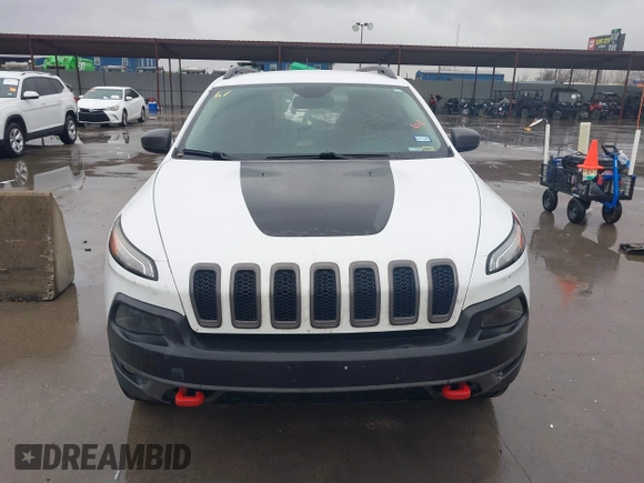 2015 Jeep Cherokee Trailhawk with VIN 1C4PJMBB1FW630519, listed as a IAAI auction lot 41605466 with 219,390 mi miles and . Bid and sale history available at carsss.com. Image 13.