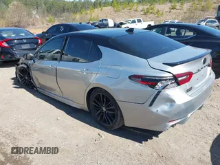 2022 Toyota Camry TRD with VIN 4T1KZ1AK8NU061810, listed as a IAAI auction lot 41769584 with 79,709 mi miles and . Bid and sale history available at DreamBid. Image 3.