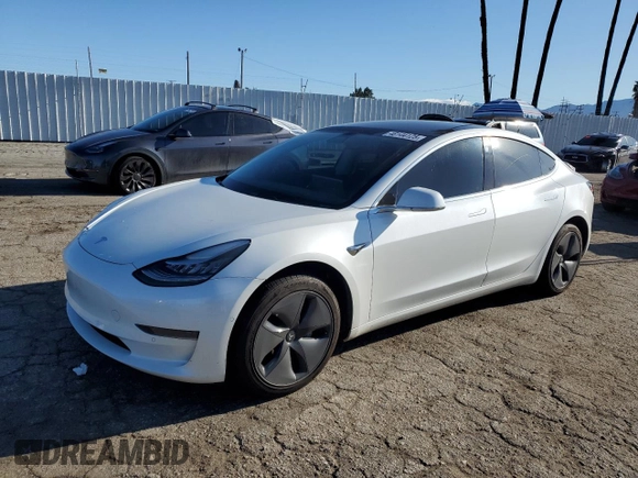 2020 Tesla Model 3 Standard Range Plus with VIN 5YJ3E1EA5LF660417, listed as a Copart auction lot 48144125 with 112,924 mi miles and Salvage Title. Bid and sale history available at DreamBid. Image 1.