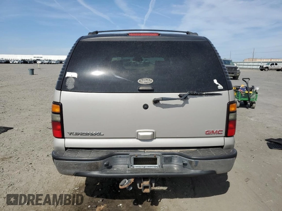 2005 GMC Yukon XL SLT z VIN 1GKFK16Z25J170446, wystawiony jako Copart lot #60833165 z przebiegiem 255 497 mil mil oraz Czysty tytuł • Clean title. Historia ofert i sprzedaży dostępna na DreamBid. Obrazek 6.