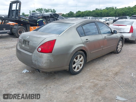 2004 Nissan Maxima SE with VIN 1N4BA41E74C858809, listed as a IAAI auction lot 42436562 with 198,105 mi miles and . Bid and sale history available at DreamBid. Image 4.