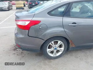 2013 Ford Focus SE with VIN 1FADP3F27DL224433, listed as a IAAI auction lot 42652229 with 127,887 mi miles and . Bid and sale history available at DreamBid. Image 6.