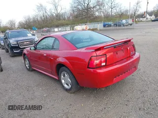 2001 Ford Mustang Standard with VIN 1FAFP40421F191957, listed as a IAAI auction lot 42005976 with 52,882 mi miles. Bid and sale history available at carsss.com. Image 3.